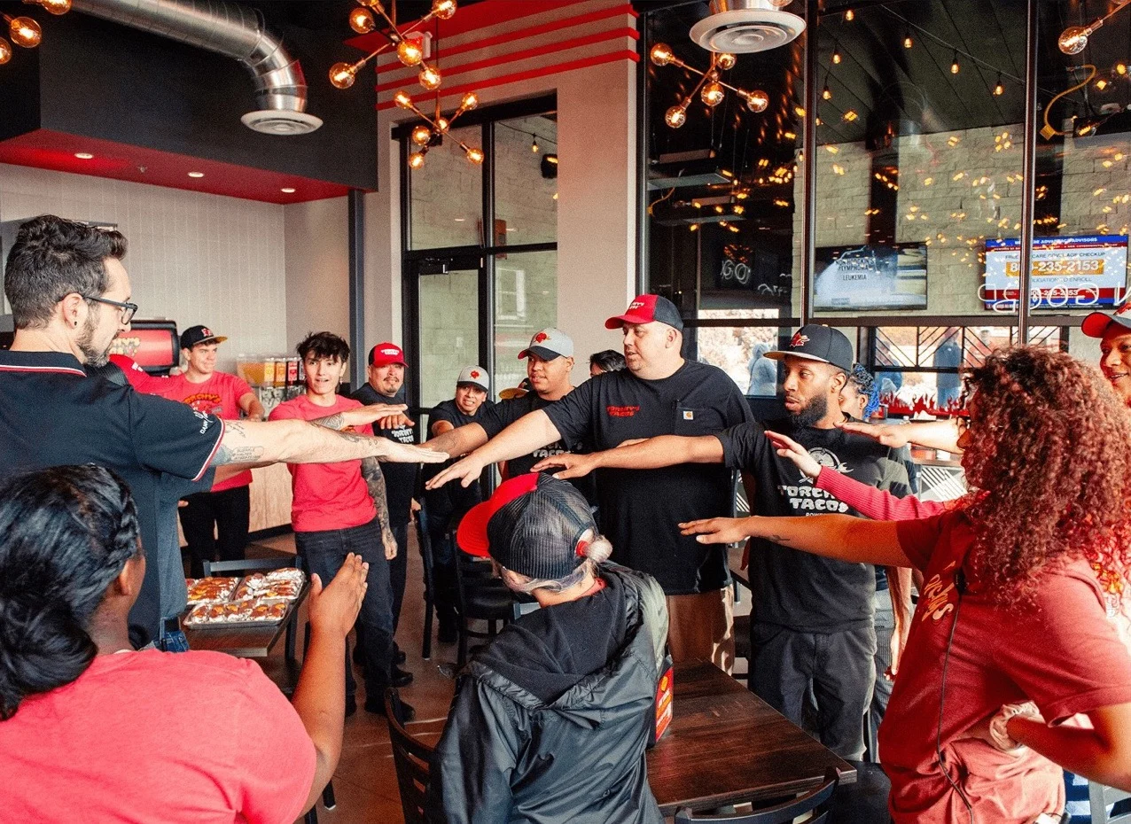 Torchy's Tacos restaurant team at work